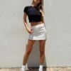 Princess Polly Adam Mini Skirt White 2 Princess Polly Adam Mini Skirt White -Eva Style Shop 0 modelinfo Emma us2 4c61fd4f 850b 41ef baaa dc9ec9b584b9